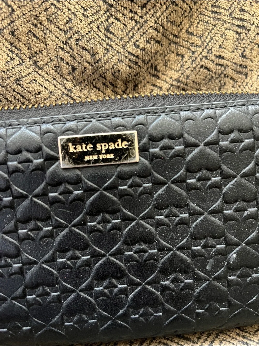 kate spade black quilted spade logo-embossed zip wallet with gold plaque